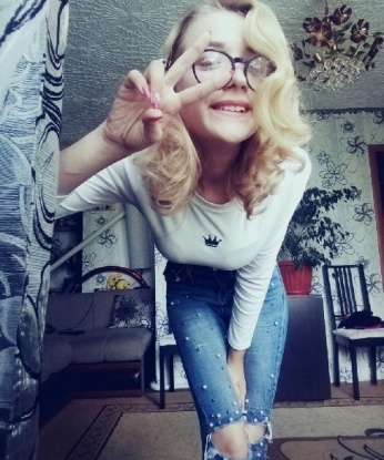 Оля